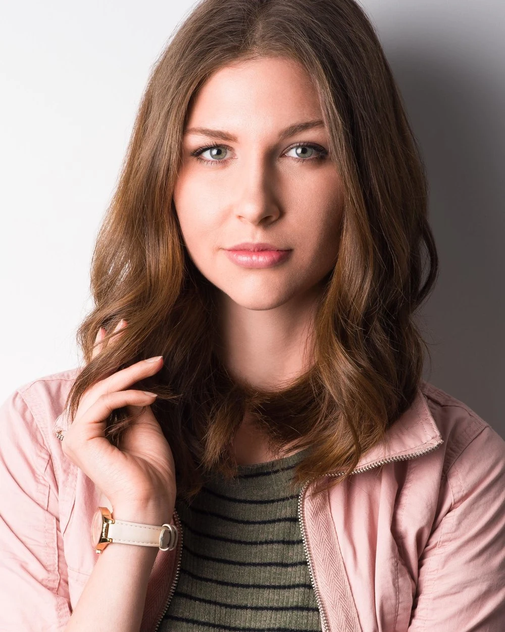 Close portrait of a woman in a pink jacket