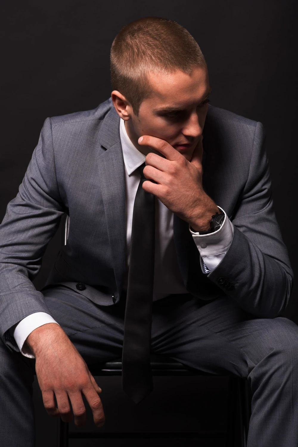 Seated portrait of a man in a suit