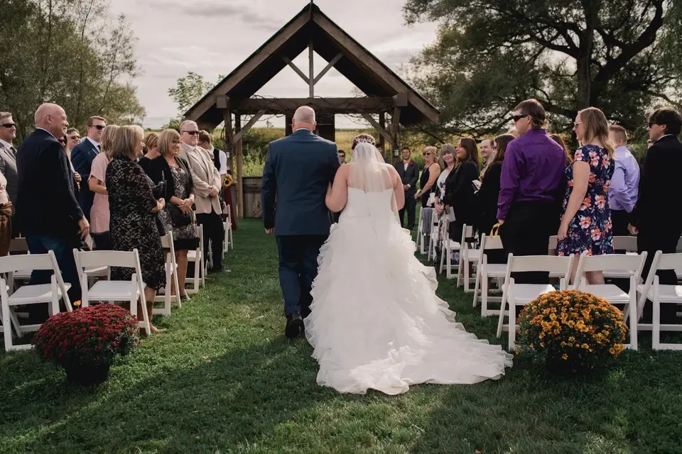 Outdoor wedding ceremony with guests