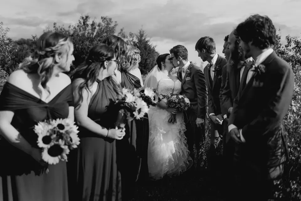 Black and white photograph of wedding guests